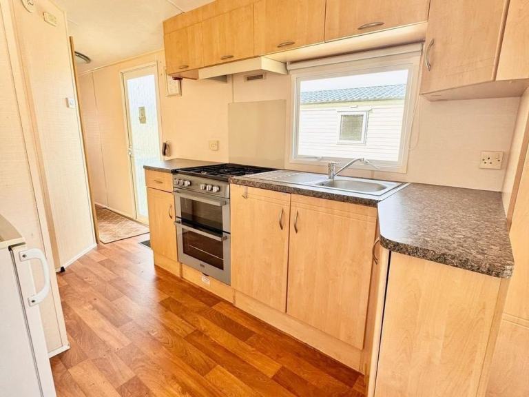SITED STATIC CARAVAN FOR SALE WITH DECKING £20K | NORTH WALES — photo 4