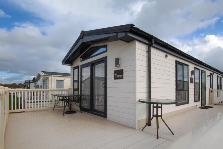 Victory Monaco 2016 static caravan & decking sited at New Beach, Dymchurch, Kent — photo 2