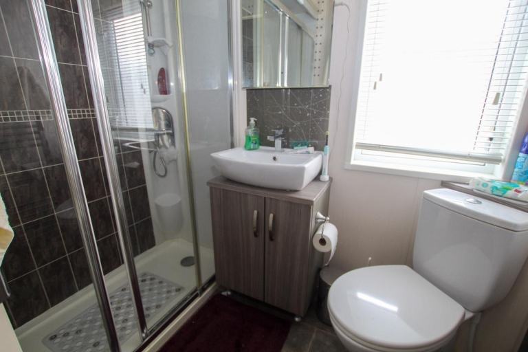 Victory Monaco 2016 static caravan & decking sited at New Beach, Dymchurch, Kent — photo 11